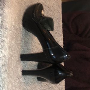 Black, patent leather great high heeled work shoes